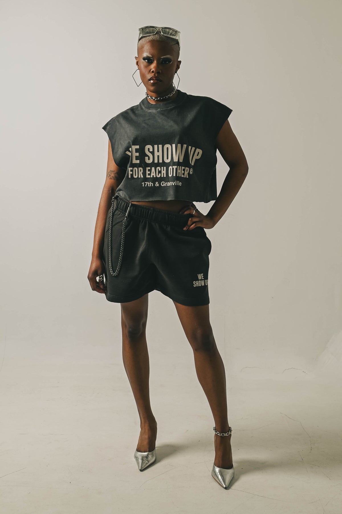 We Show Up Tanktop Cut and styled with shorts.