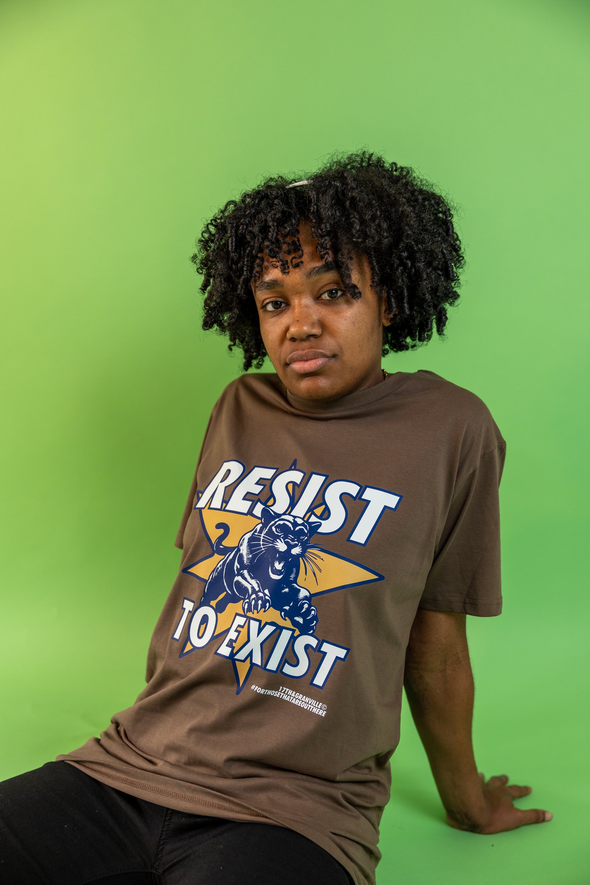 Model wearing the Resist tee.