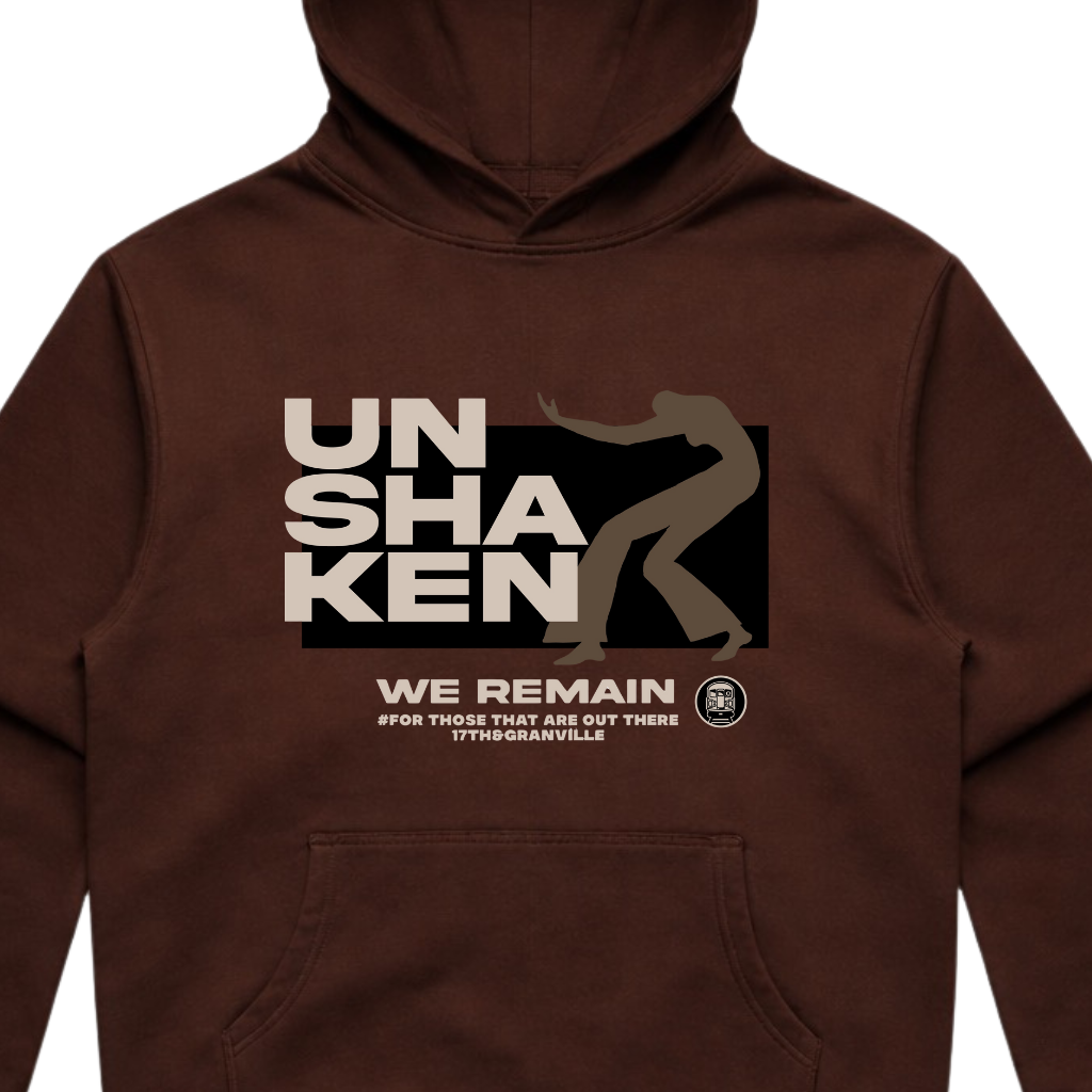 Brown hoodie with 'Unshaken' graphic design on a white background