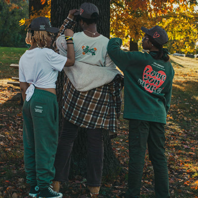 Lifestyle photo of models wearing pieces from the We Us collection.