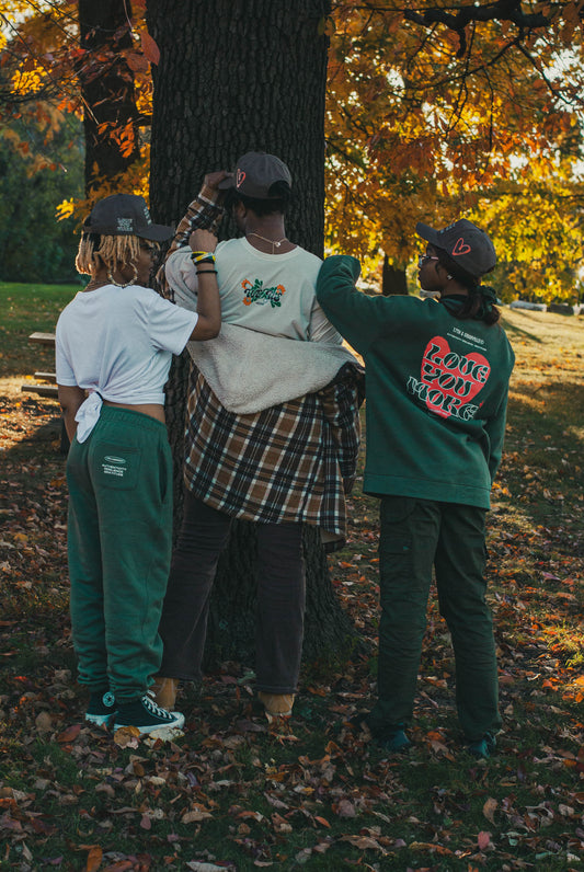 Lifestyle photo of models wearing pieces from the We Us collection.