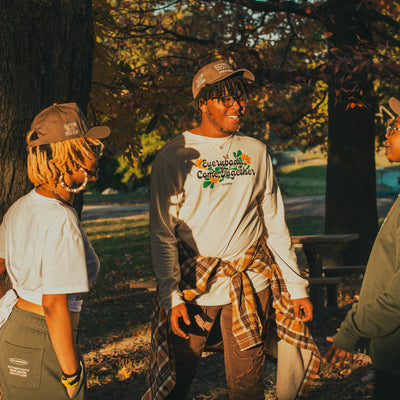 Models laughing together while wearing pieces from the We Us collection.”